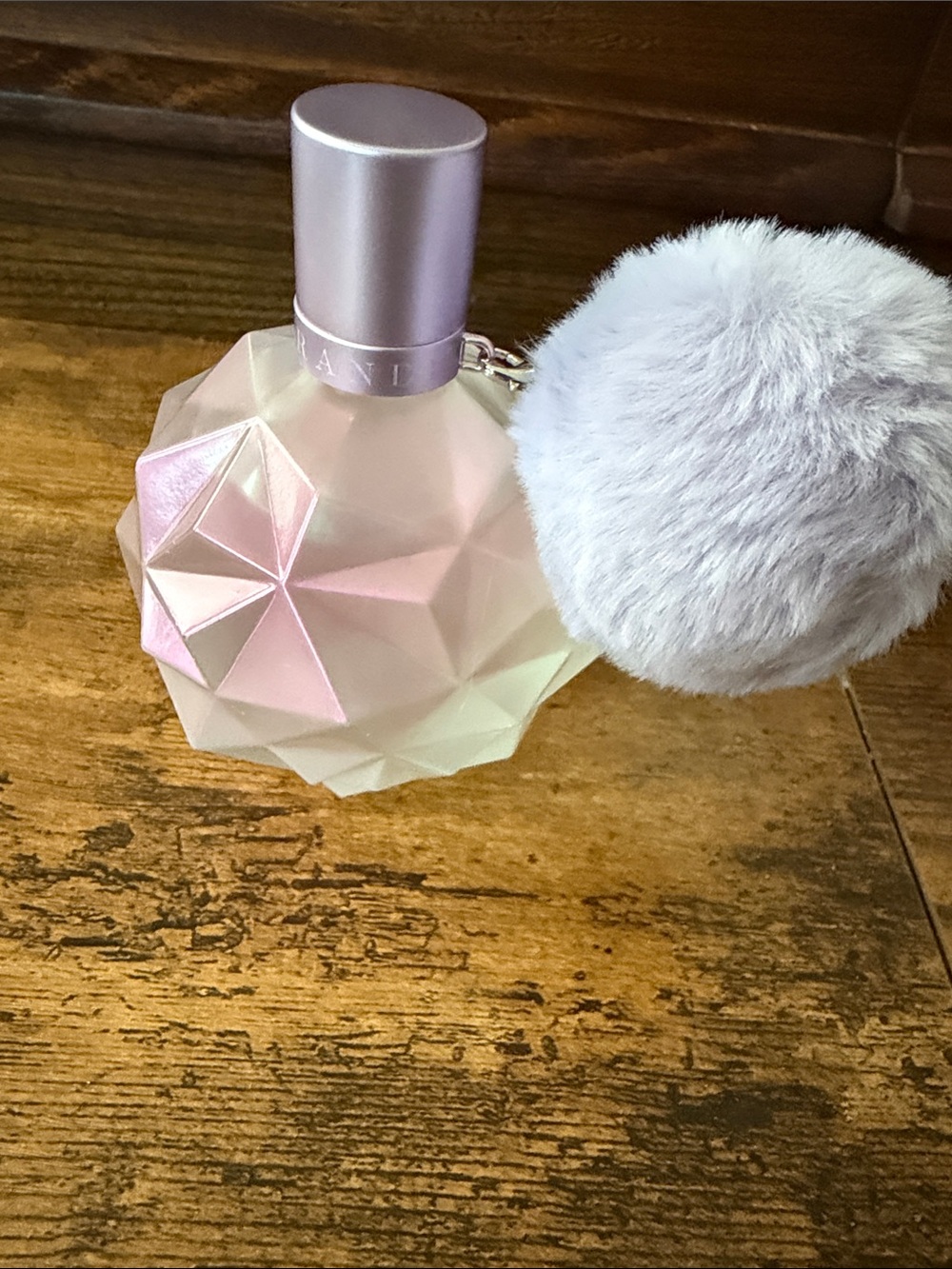 Ariana Grande Moonlight scent Iridescent Pink Faceted Bottle with Gray Pom